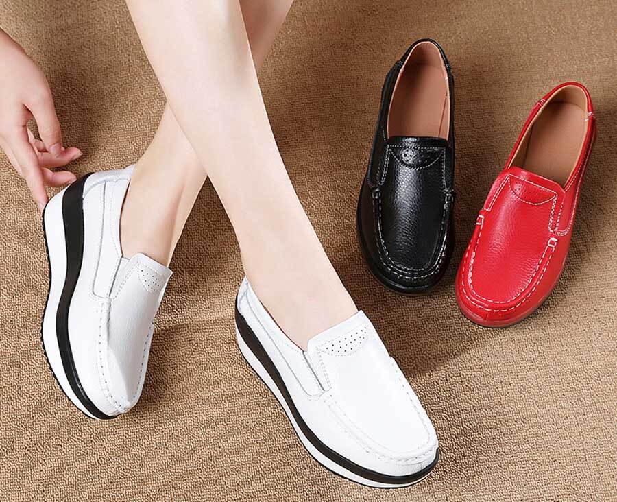 Women's sewn thread accents slip on rocker bottom shoes